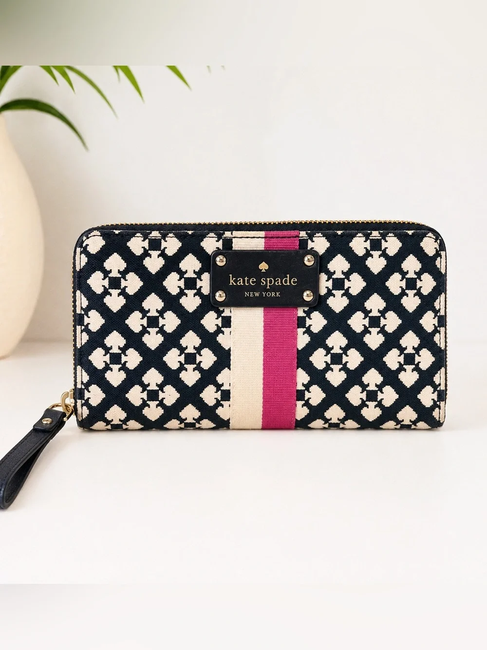kate spade navy and cream jacquard zip wallet with pink stripe